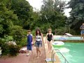 Emily gives Tim glass of water in pool Emily gives Tim glass of water in pool