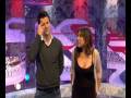 TV Presenter: Miquita Oliver Leans Over Cleavage