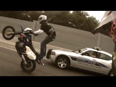 Motorcycle Stunts RIDE OF THE CENTURY ROC Bike Vs Police Street Stunt Running From The Cops Runs Cop