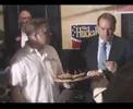 Mike Huckabee tests out the Huckaburger