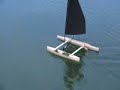 showing weighted windward hull and a more foward set sail area for maximum foward drive and helm balance.