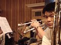 in vdo, yan pascal tortelier is rehearsing the cisma orchestra 2007. lertkiat plays first trumpet.