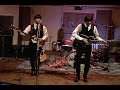 the return play to a group live at the famous abbey road studio in london, england during the 2003 international beatles week.
