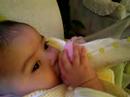 Alexandria struggles to lift her bottle Alexandria struggles to lift her bottle