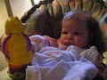 Samantha playing with one of her favorite toys