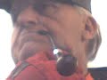 LEATHER CLOTHE, GLOVE RED, SMOKING:SMALL PIPE; CURVED