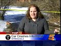 woman drives car into frozen pond