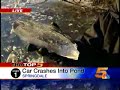 woman drives car into frozen pond