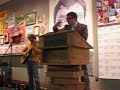 John Hodgman speaking at Powell\