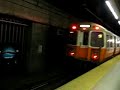 Two Boston MBTA subway orange line trains at back bay statn.