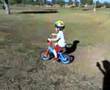 Bubba riding without training wheels