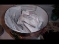 How to make a homemade shooting can out of a popcorn tin