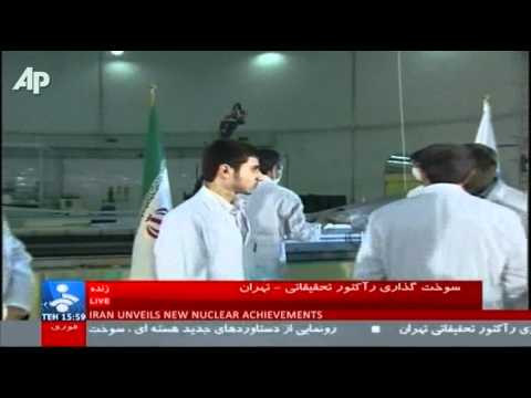 Iran reactor - Iran says it has begun loading domestically made nuclear fuel rods into its Tehran research reactor. The official IRNA news agency said Pres. Mahmoud Ahmadin...
