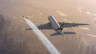 2 Jetmen fly Alongside World's Biggest plane