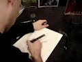 Paul Renaud sketching Spider-Man, in Montpellier, at \