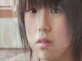 Asian teen playing with her huge tits.