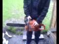 Shane starting a Husqvarna 345 chainsaw