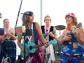 Saturn Street Strummers sing \"Unlitter It.\"