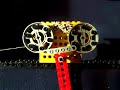 Closeup of working clock escapement made with Lego; part of series W1 thru W12
