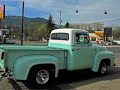 This 56 Ford F100 has been in our extended family since new.  It was originally purchased in Pixley, California.  Yes, that's right; the one over by Hooterville, Crabb's Corner, and Petticoat Junction.  Pixley is the only real town named in those old shows.  Anyhow someone in my mother's family passed away so her dad went to California from Yoncalla, Oregon to retrieve it and bring it back to the ranch they lived on.  Being a short-narrow box, it wasn't much use on the ranch so it got parked under an oak tree where it sat for at nearly 15 years.  I never saw Grandad drive it in my memory which goes back to around 1965-66.  When he passed away my mother inherited the truck and my pop went to restoring it, around 1976.  He went through the motor pretty quickly and discovered it was mechanically sound although aesthetically a wreck.  The paint, seafoam green, with the white top, was completely oxidized, and the wood plank box floor was rotted out.  After getting it ambulatory again he had a local fella redo the bench seat in a simple vinyl, bought some wide Road Huggers (70s in front, 60s in back) and chrome wheels, and slapped a cherry bomb underneath it for the appropriate growl.  Then my senior year he presented me they keys so that I could drive the two and a half blocks to school.  That was 1979.  It still had all the original glass, which was pretty pitted, and as I recall when I got to school first thing I would need to go wash the black residue off my hands.  The moisture over the years had seeped into the steering wheel and softened up the plastic.  Still it was a joy to drive—very cool looking and sounding, although the automatic transmission wasn't to my liking.   I left home later that year for college, without the '56, but its been fun over the years to see how its been transformed.  Pop worked in body shop for a few years and in his spare time he got the paint just right.  Its been lowered now and the interior nicely redone in cloth.  I got to drive it again for the first time in years about a month ago.  I was visiting the folks and dad say to me, 