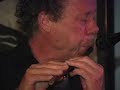 Joey Ector making flutes and performing at the World Stage