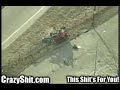 If I was the manager at this news station that cameraman would get fired immediately for missing the money shot of the car running into a tree and knocking it over.  In fact I would make the pilot push him out of the fucking choppa while it was still moving.