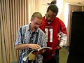 Larry Fitzgerald Leans the value of his football cards
