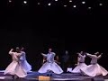 one of the wonders of turkey, whirling dervishes are performing live classical turkish and sufi music and the amazing sight of the dervishes whirling on the stage.