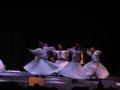 one of the wonders of turkey, whirling dervishes are performing live classical turkish and sufi music and the amazing sight of the dervishes whirling on the stage.