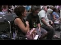 A woman bound in a wheelchair is...