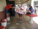 kalani high school's epic homecomming week.  robert attemps to break through the banner on his skateboard.  he jumps over the skateboard but epic fails the banner.