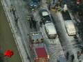 Raw Video: Bus Dangles Over Freeway After Crash