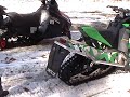 racing a brand new 2012 arctic cat f8 snopro against a 2010 arctic cat Z1 turbo,at livingstons arctic cat in hillsboro nh..the f8 has no studs on its inch and a quarter track,it has the ho 161 hp engine.the Z1 has 102 studs,and the 183 hp turbo.the f8 wins by a couple of sled lengths,in 1000 ft.on a loose snow.