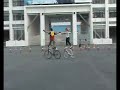 Zhou and Ines standing on Bikes Zhou and Ines standing on Bikes