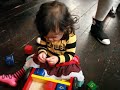 Bombi having a spot of bother with a sticker at Oscar's first birthday!