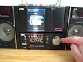 This is the fantastic JVC PC100 miniboombox with detachable walkman :-)

* edit *

The song on the tape playing is Vandenberg with Once in a lifetime

:-)