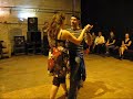 Homer Ladas and Charity Lebron perform a didactic demo at the end of an argentine tango class.