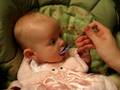 Adelynn's first time eating cereal.