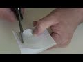 an instructional video on how to fit auto-magic filters onto a compact digital camera for use in an underwater housing