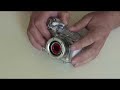 an instructional video on how to fit auto-magic filters onto a compact digital camera for use in an underwater housing