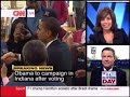 barack and michelle obama in the voting booth.