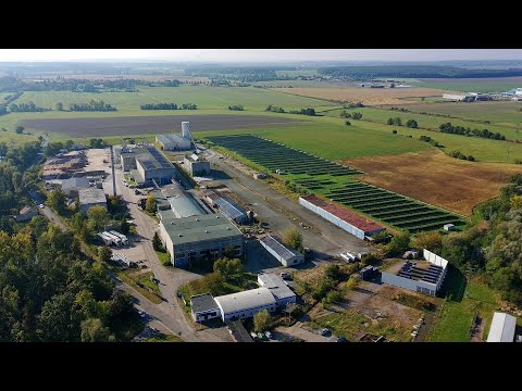 Video Zpevněný pozemek 23.838 m2 se dvěma halami a objektem garáží