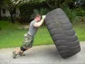 Tom Mutaffis 945 lbs tire x 7 flips
