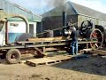fowler traction engine driving a sawbench.