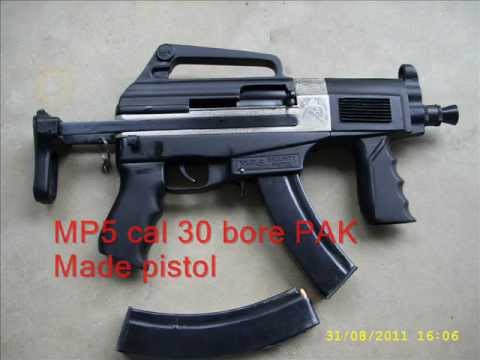 30 bore - THIS IS MP5 MODEL PISTOL CAL 30 BORE PAK MADE.25 BULLETS IN ON CARTAGE.8-12 BULLETS AUTOMATICALLY FIRE IN SECONDS.VERY NICE GUN FOR SECURITY PURPOSE.