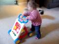 Audrey (13 months) uses walker