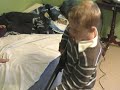 Blue playing Guitar Hero