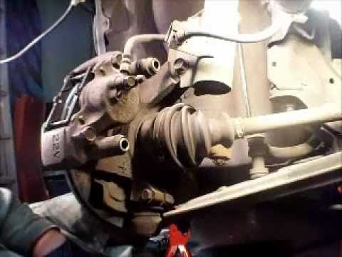 How To Replace Rotors and Brakes 1997 Mercury Tracer