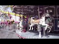 Mommy and Nora cruise around on the Merry Go Round