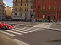ferrari f1 in rome around colosseum